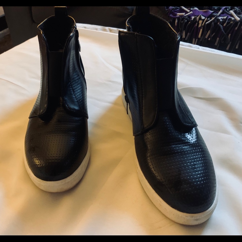 Black high top sneakers